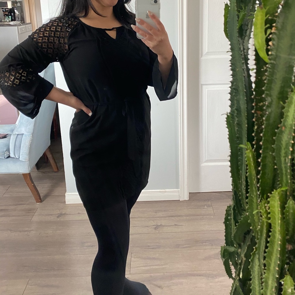 Black long-sleeve midi dress with cutout details